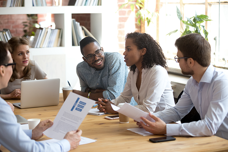 People working  together on cybersecurity policies